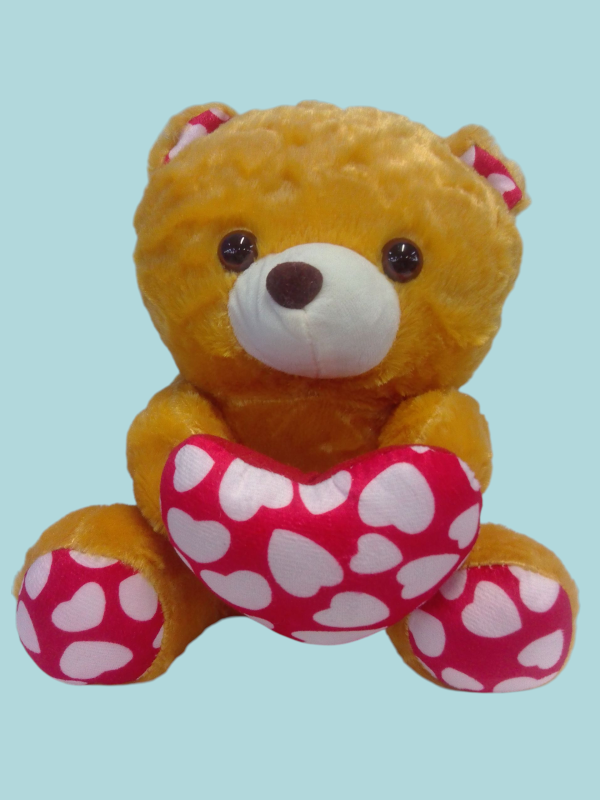 Oso de peluche con corazónes.