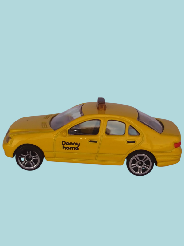 Taxi. Carrito de metal